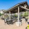 Covered patio with grills and dining area
