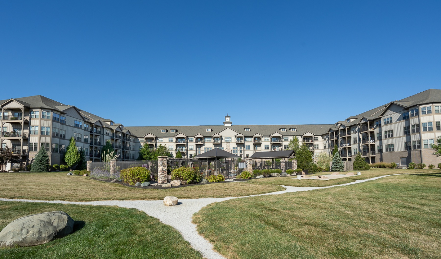 Walking path in front of apartment buildings