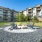 Firepit with chairs on round gravel patio